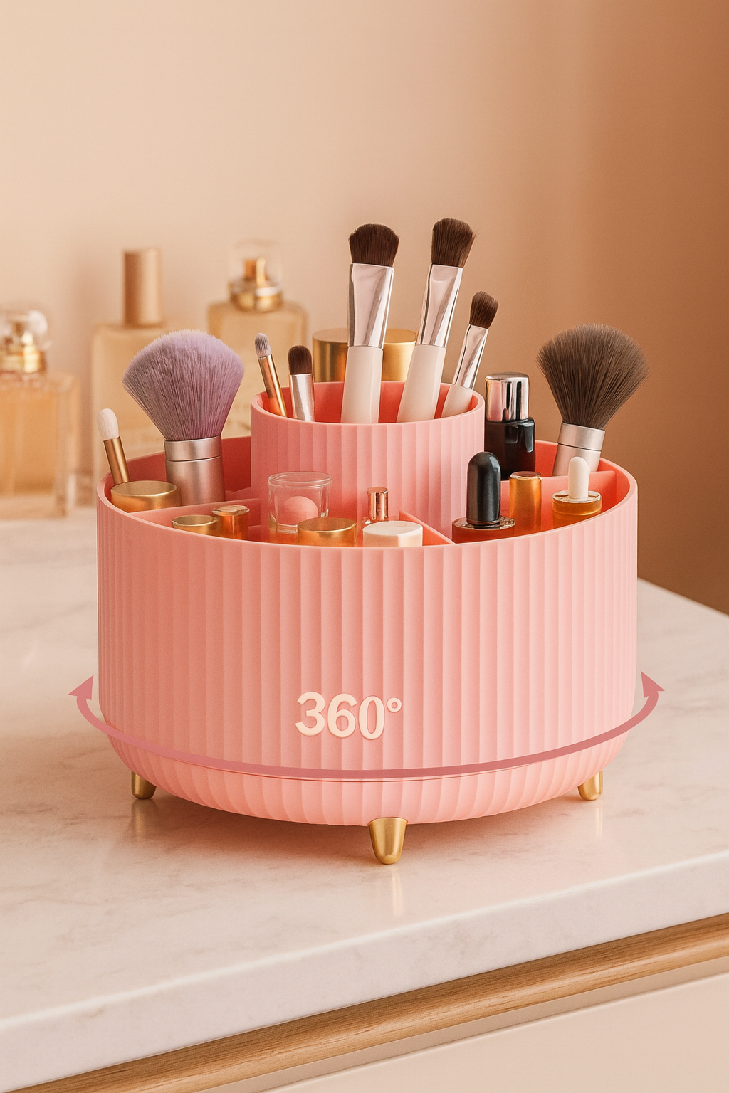 Pink makeup organizer with various brushes and products on a marble surface.